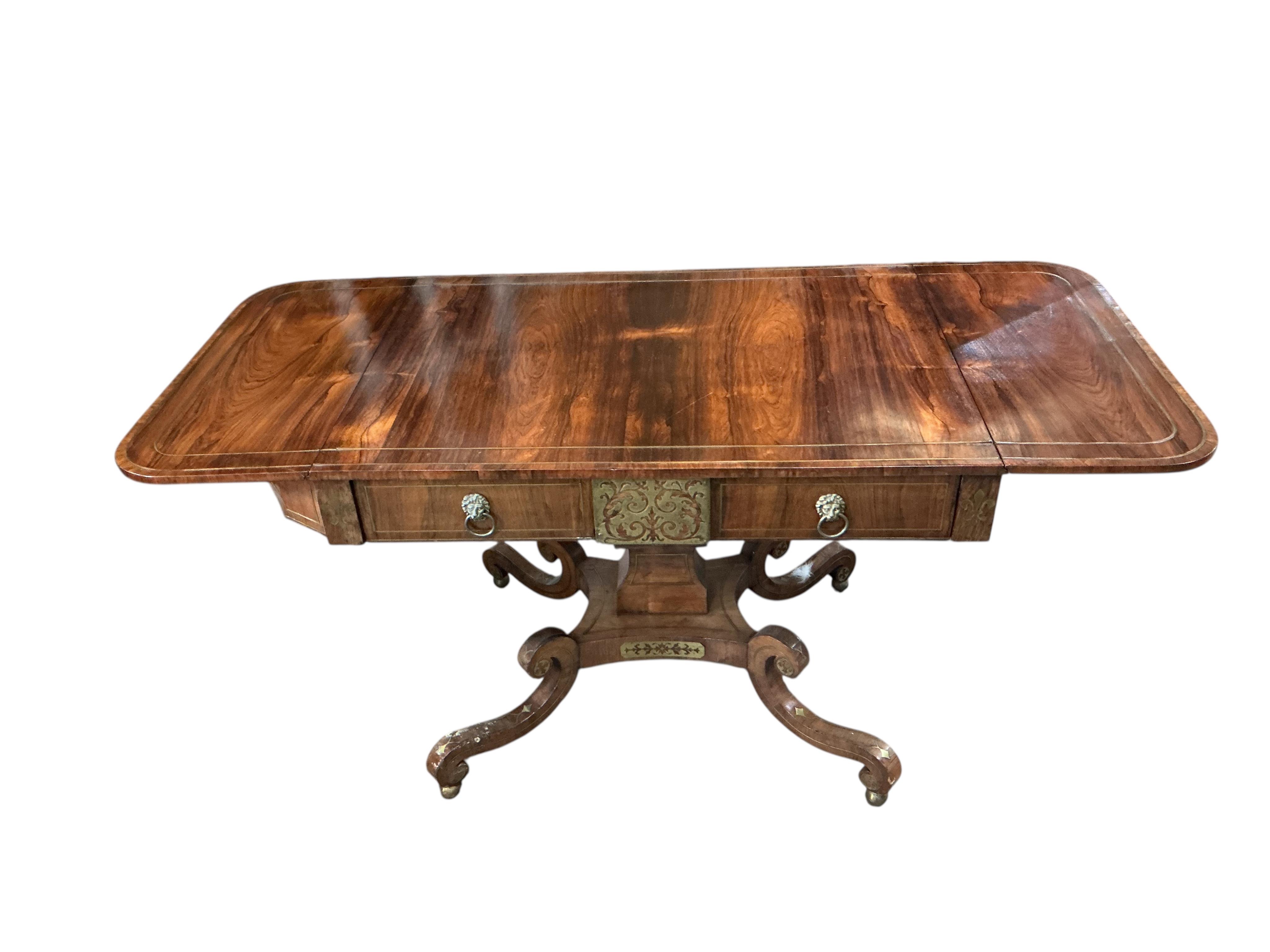 A Regency brass mounted rosewood sofa table, width 91cm, depth 66cm, height 70cm